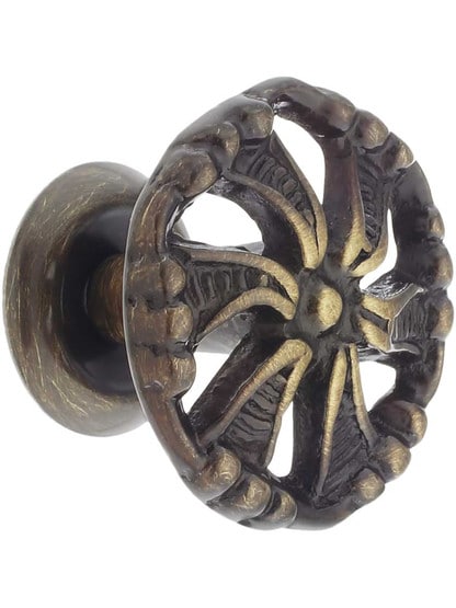 Pinwheel Cabinet Knob - 1 1/2 inch Diameter in Antique Brass.